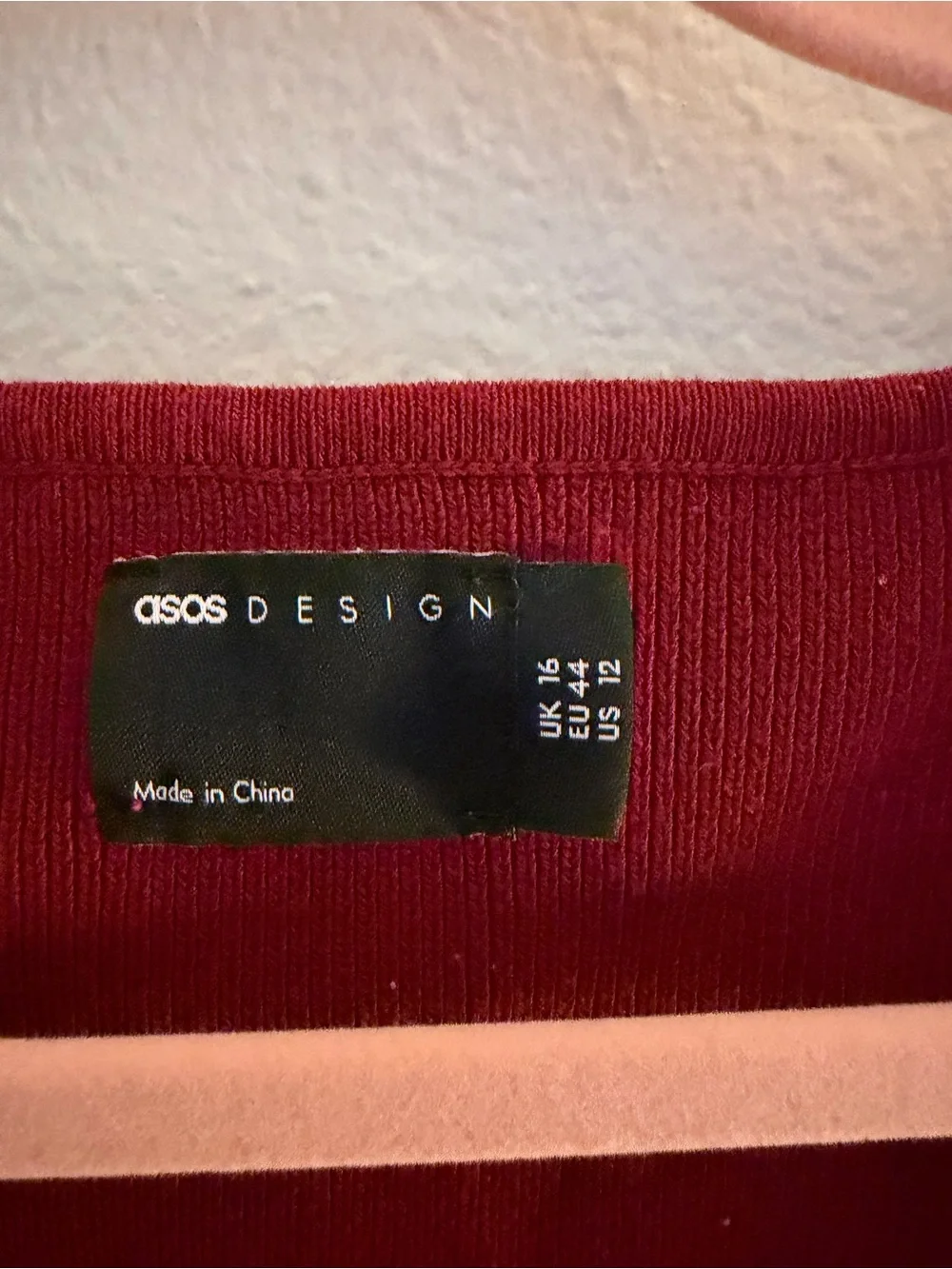 ASOS DESIGN Ribbed knitted top with plunge notch neck in Deep Wine Red